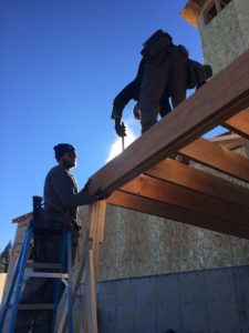 Builders working on new deck